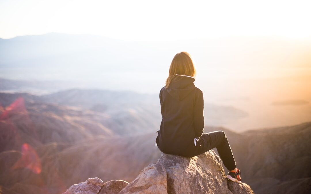Woman on mountain top