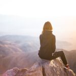 Woman on mountain top