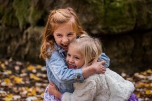 two children hugging